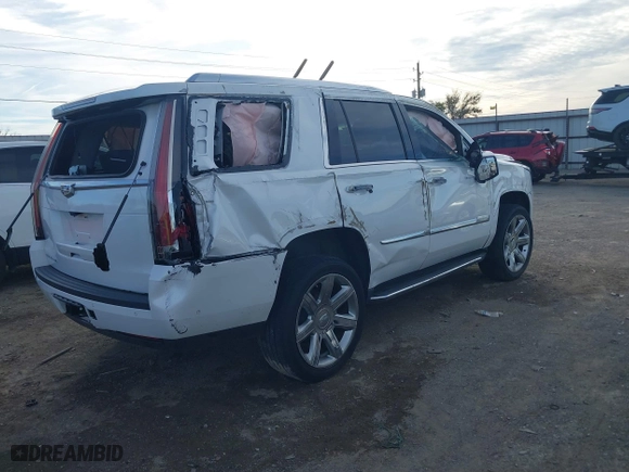 2018 Cadillac Escalade Luxury with VIN 1GYS3BKJ7JR140183, listed as a IAAI auction lot 40769705 with 106,774 mi miles. Bid and sale history available at carsss.com. Image 4.