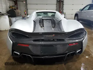 2018 McLaren 570S z VIN SBM13FAA2JW004594, wystawiony jako Copart lot #49730155 z przebiegiem Nie podano mil oraz Szkody całkowita. Historia ofert i sprzedaży dostępna na DreamBid. Obrazek 6.
