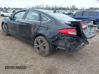 2020 Ford Fusion Titanium with VIN 3FA6P0D9XLR174523, listed as a IAAI auction lot 42100113 with 100,602 mi miles and . Bid and sale history available at DreamBid. Image 3.