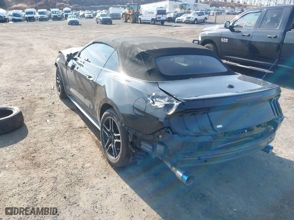 2021 Ford Mustang EcoBoost with VIN 1FATP8UH9M5103925, listed as a IAAI auction lot 41658685 with 76,869 mi miles. Bid and sale history available at carsss.com. Image 3.