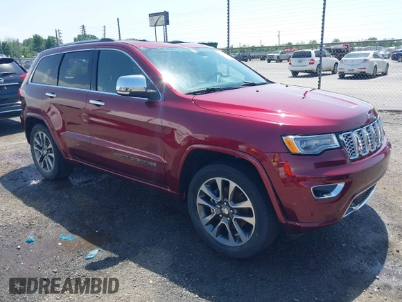 2017 Jeep Grand Cherokee Overland with VIN 1C4RJFCG7HC658943, listed as a IAAI auction lot 42282213 with 103,291 mi miles and . Bid and sale history available at DreamBid. Image 1.