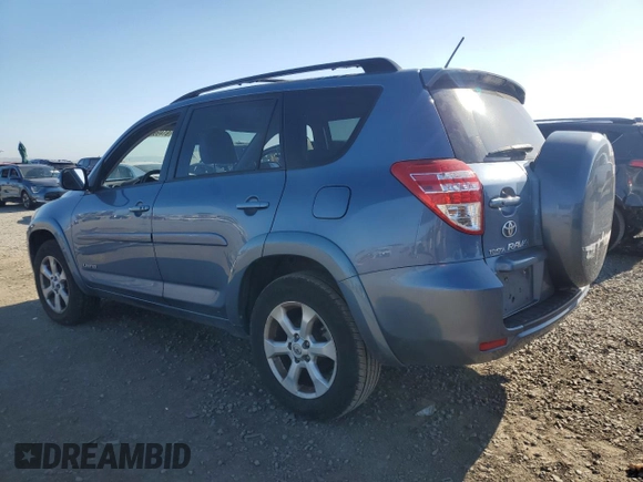 2010 Toyota RAV4 Limited with VIN JTMYK4DV1AD003591, listed as a Copart auction lot 61499555 with 100,940 mi miles and Salvage title. Bid and sale history available at DreamBid. Image 2.