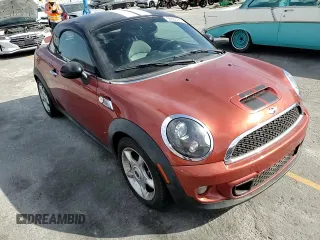 2013 MINI Coupe S z VIN WMWSX3C59DT466802, wystawiony jako Copart lot #56860965 z przebiegiem 88 053 mil mil oraz Szkoda całkowita • Salvage title. Historia ofert i sprzedaży dostępna na DreamBid. Obrazek 13.