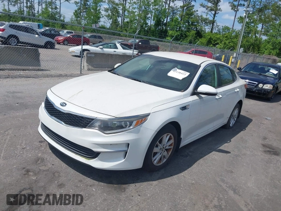 2016 Kia Optima LX z VIN KNAGT4L3XG5095972, wystawiony jako IAAI lot #42130422 z przebiegiem 103 420 mil mil oraz . Historia ofert i sprzedaży dostępna na DreamBid. Obrazek 17.