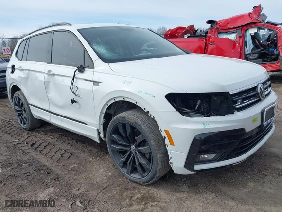 2020 Volkswagen Tiguan SE with VIN 3VV2B7AX4LM106638, listed as a IAAI auction lot 41744503 with 67,693 mi miles. Bid and sale history available at carsss.com. Image 1.