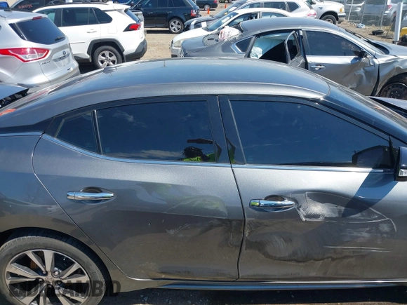 2017 Nissan Maxima SV with VIN 1N4AA6AP7HC422895, listed as a IAAI auction lot 41903816 with 98,214 mi miles and . Bid and sale history available at DreamBid. Image 13.