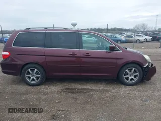 2007 Honda Odyssey Touring with VIN 5FNRL38847B048235, listed as a IAAI auction lot 41963652 with 176,412 mi miles. Bid and sale history available at carsss.com. Image 13.