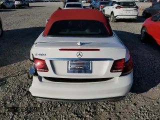 2016 Mercedes-Benz E 400 with VIN WDDKK6FF6GF332670, listed as a Copart auction lot 83417394 with 113,222 mi miles and Salvage Title. Bid and sale history available at carsss.com. Image 6.
