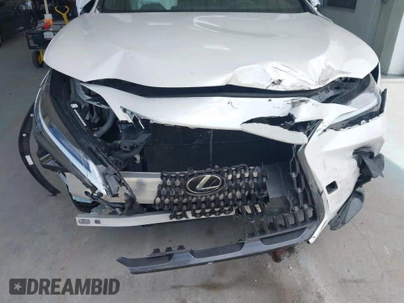 2023 Lexus NX 350h Premium z VIN 2T2GKCEZ2PC010333, wystawiony jako IAAI lot #42641664 z przebiegiem 35 369 mil mil oraz . Historia ofert i sprzedaży dostępna na DreamBid. Obrazek 6.