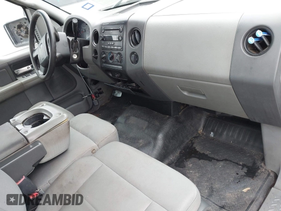 2007 Ford F-150 STX with VIN 1FTRX12W27FA79916, listed as a IAAI auction lot 41581837 with 209,945 mi miles and . Bid and sale history available at DreamBid. Image 5.