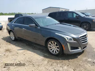 2015 Cadillac CTS Luxury RWD z VIN 1G6AR5SX2F0118726, wystawiony jako Copart lot #59198185 z przebiegiem 106 604 mil mil oraz Szkoda całkowita • Salvage title. Historia ofert i sprzedaży dostępna na DreamBid. Obrazek 4.