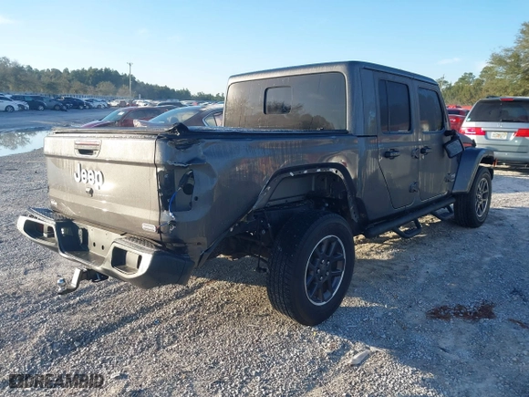 2023 Jeep Gladiator Overland with VIN 1C6HJTFG1PL546604, listed as a IAAI auction lot 41599632 with 23,108 mi miles. Bid and sale history available at carsss.com. Image 4.