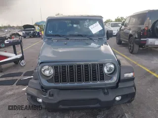 2024 Jeep Wrangler Sport S with VIN 1C4PJXDN8RW370133, listed as a IAAI auction lot 42453029 with 10,415 mi miles and . Bid and sale history available at DreamBid. Image 13.