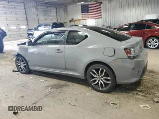 2014 Scion tC z VIN JTKJF5C71E3071683, wystawiony jako Copart lot #50971055 z przebiegiem Nie podano mil oraz Nie do naprawy • Non repairable. Historia ofert i sprzedaży dostępna na DreamBid. Obrazek 2.