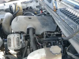 2005 Chevrolet Tahoe LT z VIN 1GNEC13T25R221733, wystawiony jako IAAI lot #41373567 z przebiegiem 250 437 mil mil oraz . Historia ofert i sprzedaży dostępna na DreamBid. Obrazek 12.