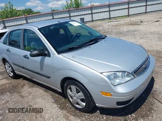 2007 Ford Focus S z VIN 1FAFP34N57W109953, wystawiony jako IAAI lot #42225399 z przebiegiem Nie podano mil oraz . Historia ofert i sprzedaży dostępna na DreamBid. Obrazek 1.
