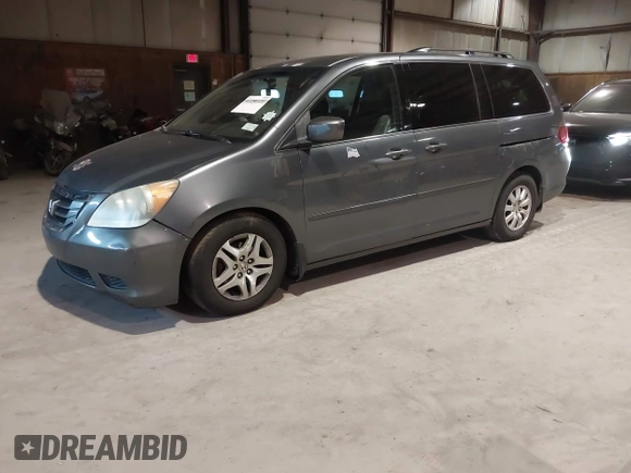 2010 Honda Odyssey EX-L with VIN 5FNRL3H78AB030111, listed as a IAAI auction lot 41250121 with 333,030 mi miles and . Bid and sale history available at DreamBid. Image 2.