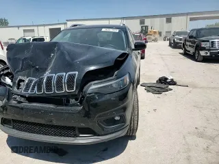 2019 Jeep Cherokee Latitude Plus z VIN 1C4PJMLBXKD409716, wystawiony jako Copart lot #56367955 z przebiegiem 53 831 mil mil oraz Szkoda całkowita • Salvage title. Historia ofert i sprzedaży dostępna na DreamBid. Obrazek 13.
