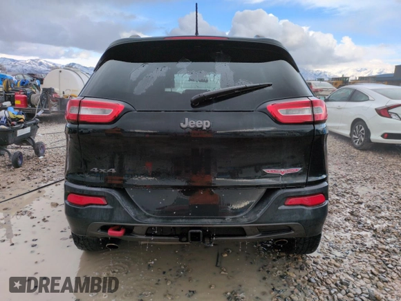 2014 Jeep Cherokee Trailhawk with VIN 1C4PJMBS1EW211570, listed as a Copart auction lot 51465845 with 156,320 mi miles and Salvage Title. Bid and sale history available at carsss.com. Image 6.