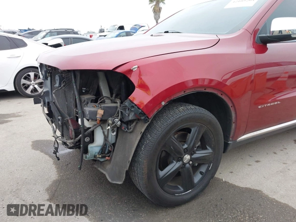 2013 Dodge Durango Citadel with VIN 1C4RDJEGXDC669937, listed as a IAAI auction lot 42105204 with 153,015 mi miles and . Bid and sale history available at DreamBid. Image 6.