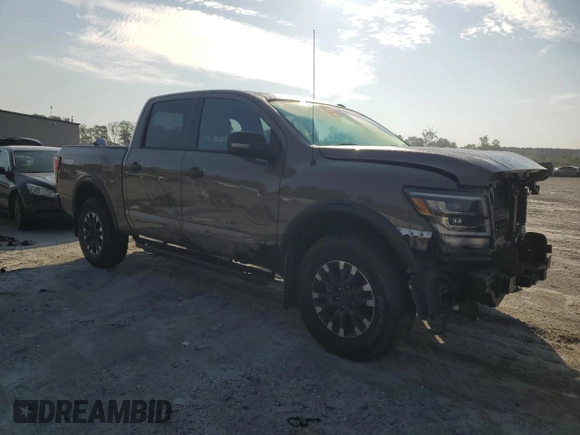 2021 Nissan Titan Pro-4X with VIN 1N6AA1ED0MN507652, listed as a Copart auction lot 62156505 with 13,085 mi miles and Salvage title. Bid and sale history available at DreamBid. Image 4.