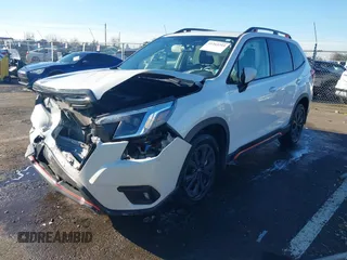 2023 Subaru Forester Sport with VIN JF2SKAJC7PH477135, listed as a IAAI auction lot 41265315 with 13,065 mi miles. Bid and sale history available at carsss.com. Image 2.