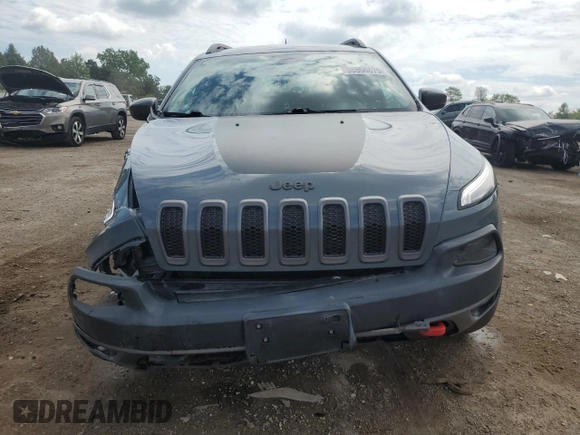 2015 Jeep Cherokee Trailhawk with VIN 1C4PJMBB1FW630715, listed as a Copart auction lot 58559675 with 58,302 mi miles and Salvage title. Bid and sale history available at DreamBid. Image 5.