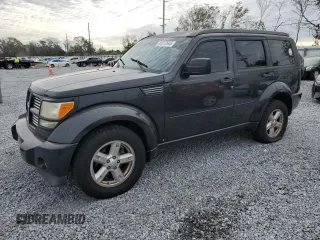 2010 Dodge Nitro SXT z VIN 1D4PT5GK7AW125959, wystawiony jako Copart lot #41517645 z przebiegiem 156 324 mil mil oraz Nie do naprawy. Historia ofert i sprzedaży dostępna na DreamBid. Obrazek 1.