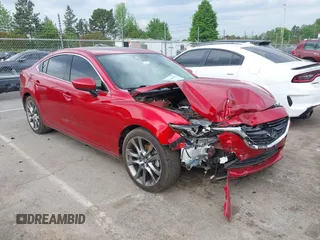 2016 Mazda 6 i Grand Touring with VIN JM1GJ1W57G1460281, listed as a IAAI auction lot 42016051 with 89,784 mi miles. Bid and sale history available at carsss.com. Image 1.
