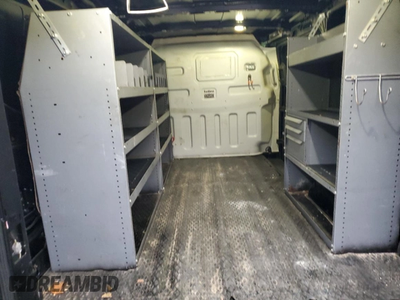 2016 Ford Transit Cargo z VIN 1FTYE1YM4GKA61271, wystawiony jako Copart lot #87135384 z przebiegiem 177 741 mil mil oraz Szkoda całkowita • Salvage title. Historia ofert i sprzedaży dostępna na DreamBid. Obrazek 10.