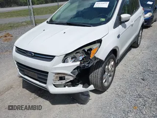2013 Ford Escape SE with VIN 1FMCU0G90DUB37052, listed as a IAAI auction lot 42132973 with 169,975 mi miles and . Bid and sale history available at DreamBid. Image 6.