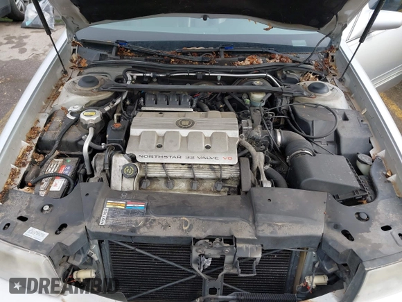 1999 Cadillac DeVille z VIN 1G6KD54Y6XU734741, wystawiony jako IAAI lot #42121114 z przebiegiem 152 829 mil mil oraz . Historia ofert i sprzedaży dostępna na DreamBid. Obrazek 10.