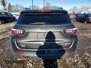 2019 Jeep Compass Trailhawk with VIN 3C4NJDDB5KT775860, listed as a Copart auction lot 48113695 with 76,091 mi miles and Salvage Title. Bid and sale history available at DreamBid. Image 6.