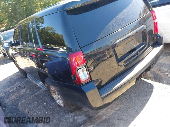 2015 Chevrolet Tahoe Commercial with VIN 1GNLC2EC3FR280365, listed as a IAAI auction lot 40580594 with 195,740 mi miles and . Bid and sale history available at DreamBid. Image 3.