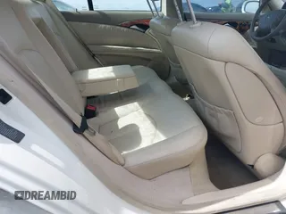 2003 Mercedes-Benz E-Class 3.2L with VIN WDBUF65J23A120318, listed as a IAAI auction lot 41927993 with 113,578 mi miles. Bid and sale history available at carsss.com. Image 8.
