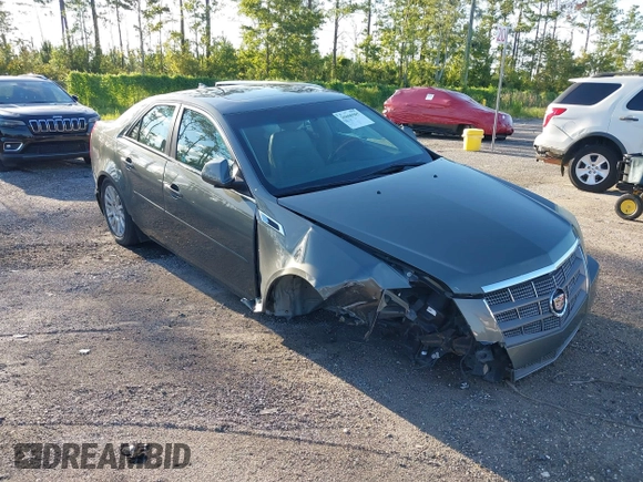 2011 Cadillac CTS Luxury with VIN 1G6DE5EY5B0154563, listed as a IAAI auction lot 36806985 with 92,635 mi miles and . Bid and sale history available at DreamBid. Image 1.