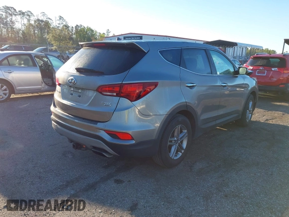2018 Hyundai Santa Fe 2.4L z VIN 5NMZTDLB8JH098926, wystawiony jako IAAI lot #41816513 z przebiegiem 92 920 mil mil oraz . Historia ofert i sprzedaży dostępna na DreamBid. Obrazek 4.