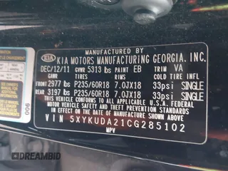 2012 Kia Sorento EX with VIN 5XYKUDA21CG285102, listed as a IAAI auction lot 41749176 with 154,034 mi miles. Bid and sale history available at carsss.com. Image 9.