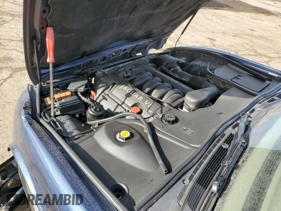 2003 Jaguar XJ 8 z VIN SAJDA14C13LF51313, wystawiony jako Copart lot #42750105 z przebiegiem Nie podano mil oraz Czysty tytuł • Clean title. Historia ofert i sprzedaży dostępna na DreamBid. Obrazek 11.