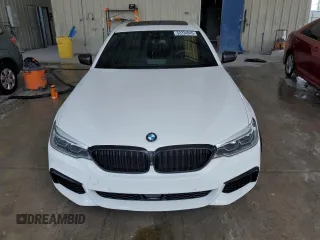 2020 BMW 5 Series M550i xDrive z VIN WBAJS7C07LBN96328, wystawiony jako Copart lot #52234045 z przebiegiem 46 515 mil mil oraz Nie do naprawy • Non repairable. Historia ofert i sprzedaży dostępna na DreamBid. Obrazek 5.
