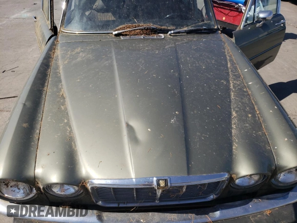 1974 Jaguar XJ with VIN UE2T52398, listed as a Copart auction lot 59589415 with 93,740 mi miles and Clean title. Bid and sale history available at DreamBid. Image 11.