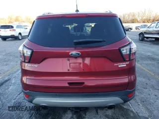 2017 Ford Escape Titanium with VIN 1FMCU0JD7HUD41107, listed as a Copart auction lot 85657084 with 197,982 mi miles and Salvage Title. Bid and sale history available at DreamBid. Image 6.