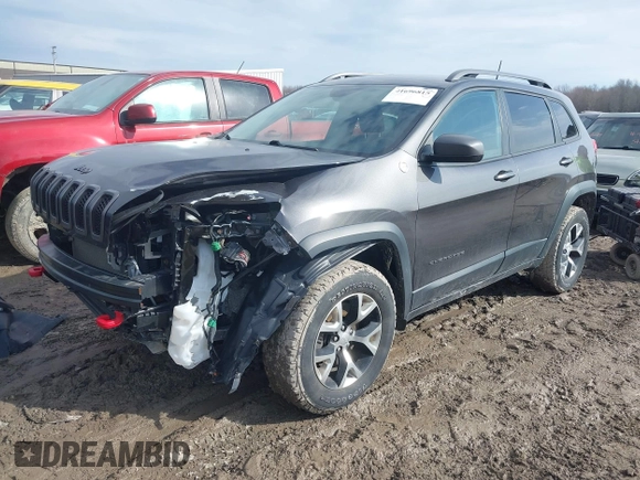 2017 Jeep Cherokee Trailhawk z VIN 1C4PJMBS0HW649422, wystawiony jako IAAI lot #41696815 z przebiegiem 62 185 mil mil oraz . Historia ofert i sprzedaży dostępna na DreamBid. Obrazek 2.