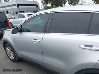 2018 Kia Sportage LX with VIN KNDPM3AC1J7332664, listed as a IAAI auction lot 42011665 with 219,293 mi miles. Bid and sale history available at carsss.com. Image 15.
