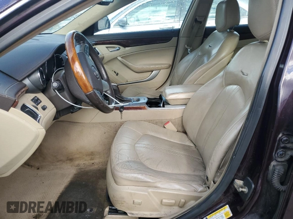 2009 Cadillac CTS AWD z VIN 1G6DG577190129300, wystawiony jako Copart lot #55802785 z przebiegiem 166 399 mil mil oraz Szkoda całkowita • Salvage title. Historia ofert i sprzedaży dostępna na DreamBid. Obrazek 7.