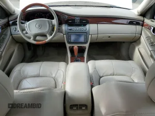 2003 Cadillac DeVille DTS z VIN 1G6KF57993U201484, wystawiony jako Copart lot #43742375 z przebiegiem 53 478 mil mil oraz Szkody całkowita. Historia ofert i sprzedaży dostępna na DreamBid. Obrazek 8.