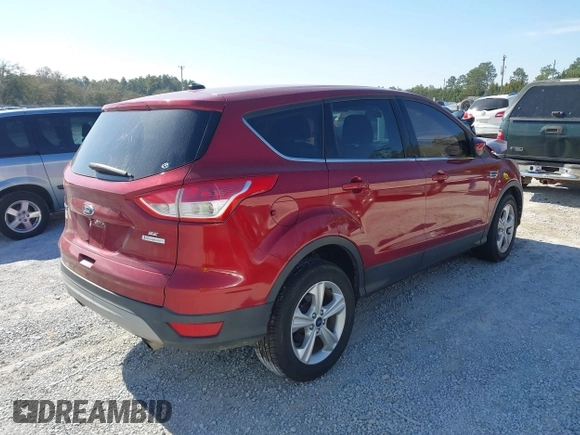 2014 Ford Escape SE with VIN 1FMCU0GX7EUA34887, listed as a IAAI auction lot 41708754 with 156,656 mi miles. Bid and sale history available at carsss.com. Image 4.