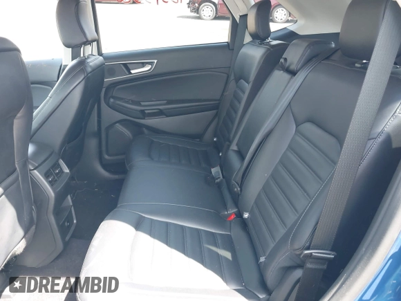 2024 Ford Edge SEL z VIN 2FMPK4J96RBB00933, wystawiony jako IAAI lot #42393326 z przebiegiem 28 710 mil mil oraz . Historia ofert i sprzedaży dostępna na DreamBid. Obrazek 8.