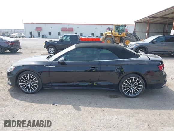 2020 Audi A5 Cabriolet Premium z VIN WAUWNGF50LN000334, wystawiony jako IAAI lot #41919556 z przebiegiem 56 494 mil mil oraz . Historia ofert i sprzedaży dostępna na DreamBid. Obrazek 14.