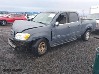 2005 Toyota Tundra SR5 with VIN 5TBET341X5S464007, listed as a IAAI auction lot 41232752 with 225,599 mi miles. Bid and sale history available at carsss.com. Image 2.